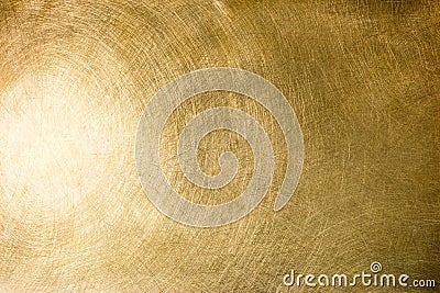 Brushed brass plate with multiple scratches and light reflection Stock Photo