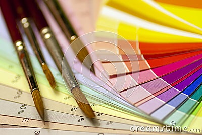 Brushes on a color print of pantone statistics offset scale Stock Photo