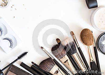 Brushes for decorative cosmetics for make up on white background top view flatlay. Stock Photo