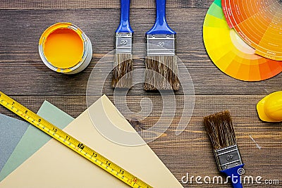 Brushes, paunts and palette on wooden table background top view Stock Photo
