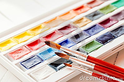 Brushes for water color painting and set of watercolor paints Stock Photo