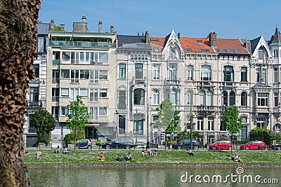 Brussels, Belgium - April 21 2018: People enjoying sunny weather at Ixelles/Elsene lakes Editorial Stock Photo