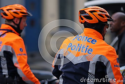 Belgian policemen on bicycles Editorial Stock Photo