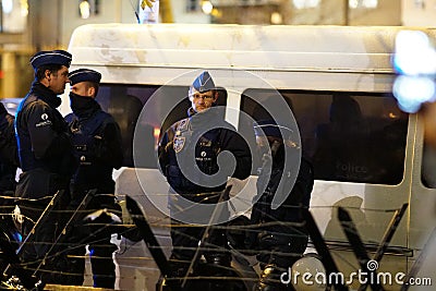 Belgian policemen at night Editorial Stock Photo