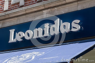 Logo and sign of Leonidas. Leonidas is store with Belgian chocolate Editorial Stock Photo