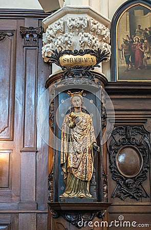 Santa Barbara Satue in Saint Nicolas church, Brussels Belgium. Editorial Stock Photo