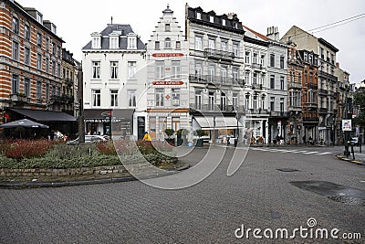 There are townhouses around a small roundabout Editorial Stock Photo