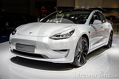 BRUSSELS - JAN 9, 2020: New Tesla Model 3 electric car presented at the Brussels Autosalon 2020 Motor Show Editorial Stock Photo
