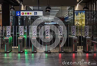 Brussels Old Town, Brussels Capital Region , Belgium - Access control gates at the renovated interior of the de Beurs - La Bourse Editorial Stock Photo