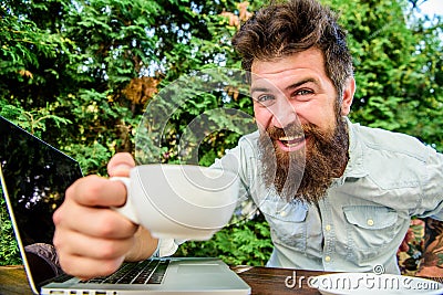 Brutal bearded hipster at coffee break. happy man with laptop. agile business. Business success. office worker Stock Photo