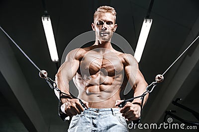 Brutal caucasian handsome fitness men on diet training chest pumping Stock Photo