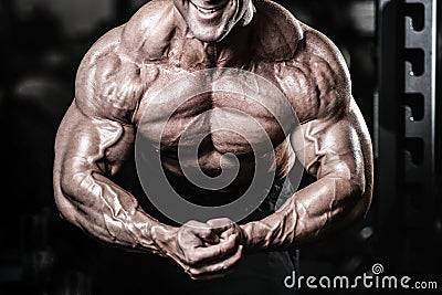 Brutal caucasian handsome fitness men on diet training chest pum Stock Photo