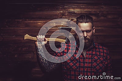 Brutal man with beard and tattooe. Stock Photo