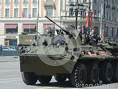 The BTR-82A is an Russian 8x8 wheeled amphibious armoured personnel carrier (APC) with Marines. Editorial Stock Photo