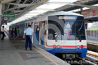 BTS or Skytrain stop receive people at Mochit station Editorial Stock Photo