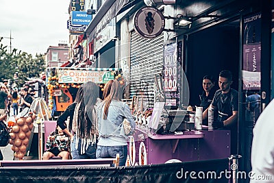 Bubble waffles stall on Camden High Street in Camden Town, London Editorial Stock Photo