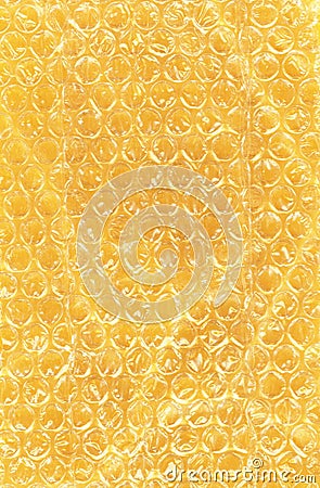 Bubble Wrap on Yellow Paper Stock Photo
