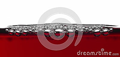 Bubbles in red wine Stock Photo