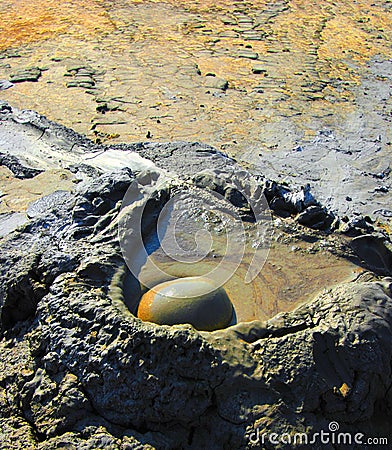 Bubbling mud volcano Stock Photo