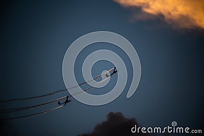 Bucharest international air show BIAS, air glider duo aerobatic team silhouette Stock Photo