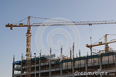 Bucharest, Romania - January 25, 2018: Big yellow cranes construction building in Orhideea area of Bucharest. Editorial Stock Photo