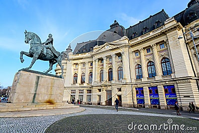 The Central University Library (Biblioteca Centrala Universitara) and monument of King Carol I Editorial Stock Photo