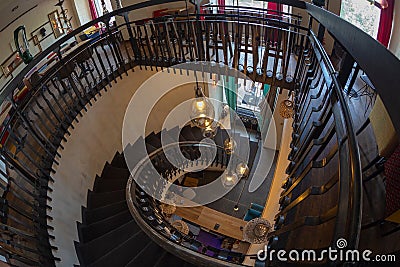 Interior of a luxrious bar with internal wood stair Editorial Stock Photo