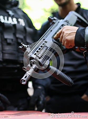 Details of a Romanian SIAS the service for special action of the Romanian Police, equivalent of SWAT in the US officer holding a Editorial Stock Photo