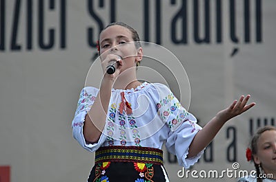 International Folklore Festival: Romanian girl singer Editorial Stock Photo