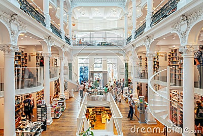 People Looking For A Wide Variety Of Books For Sale In Beautiful Library Book Store Editorial Stock Photo