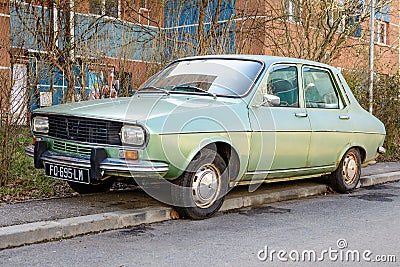 Bucharest, Romania, 3 March 2021 Old retro vivid green Romanian Dacia 1300 classic car parked in a street in a sunny spring day Editorial Stock Photo