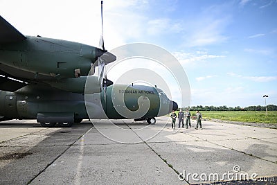 Lockheed C-130 Hercules military cargo airplane on the The Romanian Air Force 90th Airlift Base Editorial Stock Photo