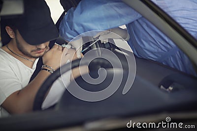 A man is getting Covid-19 vaccine in his arm in his car, in a drive thru vaccination centre in Bucharest, Romania Editorial Stock Photo