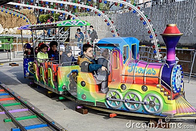 Bucharest, Romania - 28 November 2021: Colorful children train with toys at a Christmas Market in Drumul Taberei Park Parcul Editorial Stock Photo