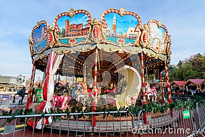 Bucharest, Romania, 30 November 2023: Vivid colorful carousel at the West Side Christmas Market in Drumul Taberei neignbourhood, Editorial Stock Photo