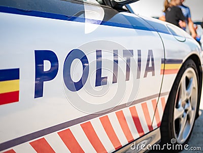 Police car on the street. Romanian police patrolling. Close up Editorial Stock Photo