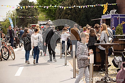 Bucharest, Romania: 21.04.2019 - Street Food Truck festival. People walking around at a street food festival in the Editorial Stock Photo