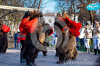 Bucharest, Romania, 25th of December 2019: Christmas tradition festival in Balkans, Romanian dancers and actors in traditional Editorial Stock Photo