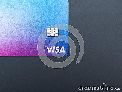 Visa credit or debit card on grey background. Online electronic commerce concept Editorial Stock Photo