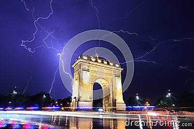 Bucharest Triumph Arch in the light storm by night Editorial Stock Photo