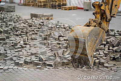 Bucket escalator dismantle the stone in city Stock Photo