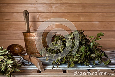 A bucket of water and a birch bath whisk in a traditional Stock Photo