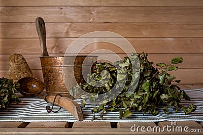 A bucket of water and a birch bath whisk Stock Photo