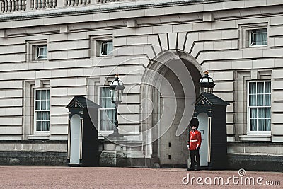 Buckingham Palace Queens guards standing strong Editorial Stock Photo