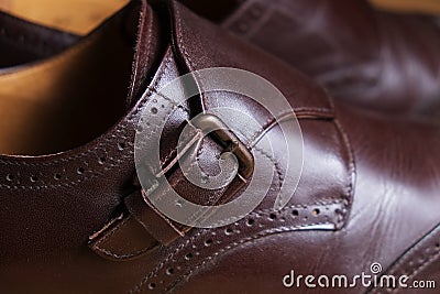 Buckle detail of a pair of classic brown Brogue shoes Stock Photo