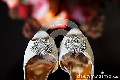 Buckles with crystals on wedding shoes Stock Photo