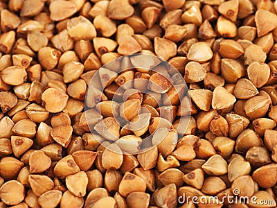 Buckwheat grains background Stock Photo