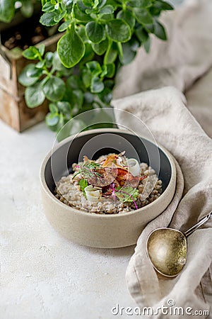 Buckwheat with vegetables greens with kithchen towel spoon leaf cafe restaurant cuisine Stock Photo