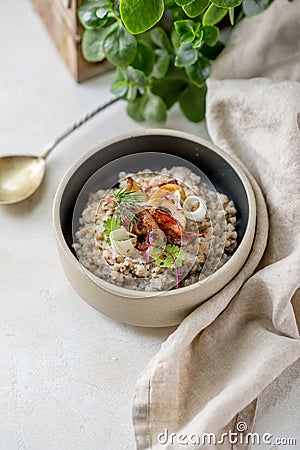 Buckwheat with vegetables greens with kithchen towel spoon leaf cafe restaurant cuisine Stock Photo