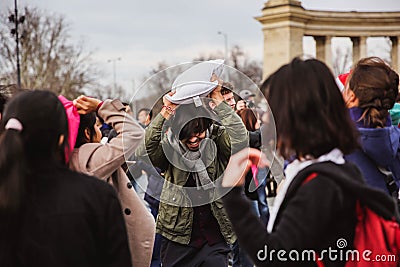 BUDAPEST APRIL 07, 2018: Group of people participate in pillow fight on International Pillow Fight Day on April 5 on the Editorial Stock Photo
